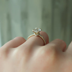 The Sofia Set  With A 3 Carat Oval 18K Yellow Gold Moissanite