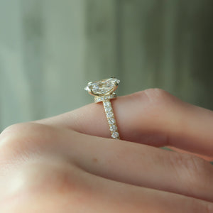 The Sofia Set  With A 3 Carat Oval 18K Yellow Gold Moissanite
