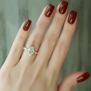 The Sofia Set  With A 3 Carat Oval 18K Yellow Gold Moissanite