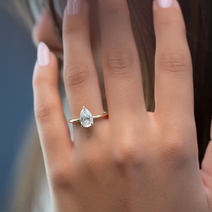 The Kamellie Set  With A 2.5 Carat Pear 14K Yellow Gold Moissanite