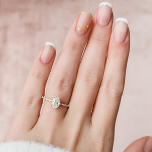 The Pave Kamellie Set With A 1.5 Carat Oval 14K Rose Gold Lab Diamond