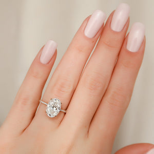 The Pave Kamellie Set With A 1.5 Carat Oval 14K Rose Gold Lab Diamond