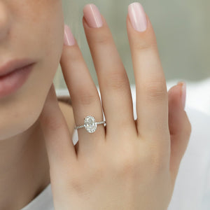 The Pave Kamellie Set  With A 1.5 Carat Oval 18K White Gold Moissanite