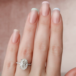 The Pave Kamellie Set  With A 3 Carat Oval 18K White Gold Moissanite