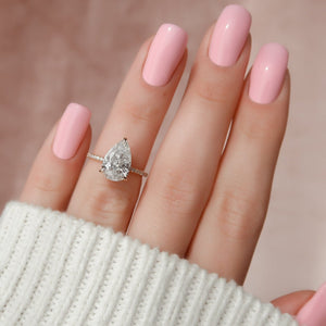 The Pave Kamellie Set  With A 5 Carat Pear 14K Rose Gold Moissanite