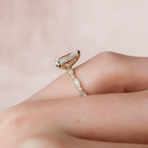 The Jasmine Set  With A 2 Carat Pear 14K Yellow Gold Moissanite