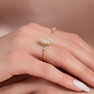 The Mia Set With A 2.5 Carat Oval 18K Yellow Gold Lab Diamond