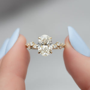 The Mia Set With A 2.5 Carat Oval 18K Yellow Gold Lab Diamond