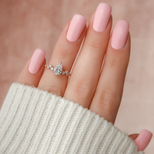 The Mia Set With A 1 Carat Pear 14K Rose Gold Lab Diamond