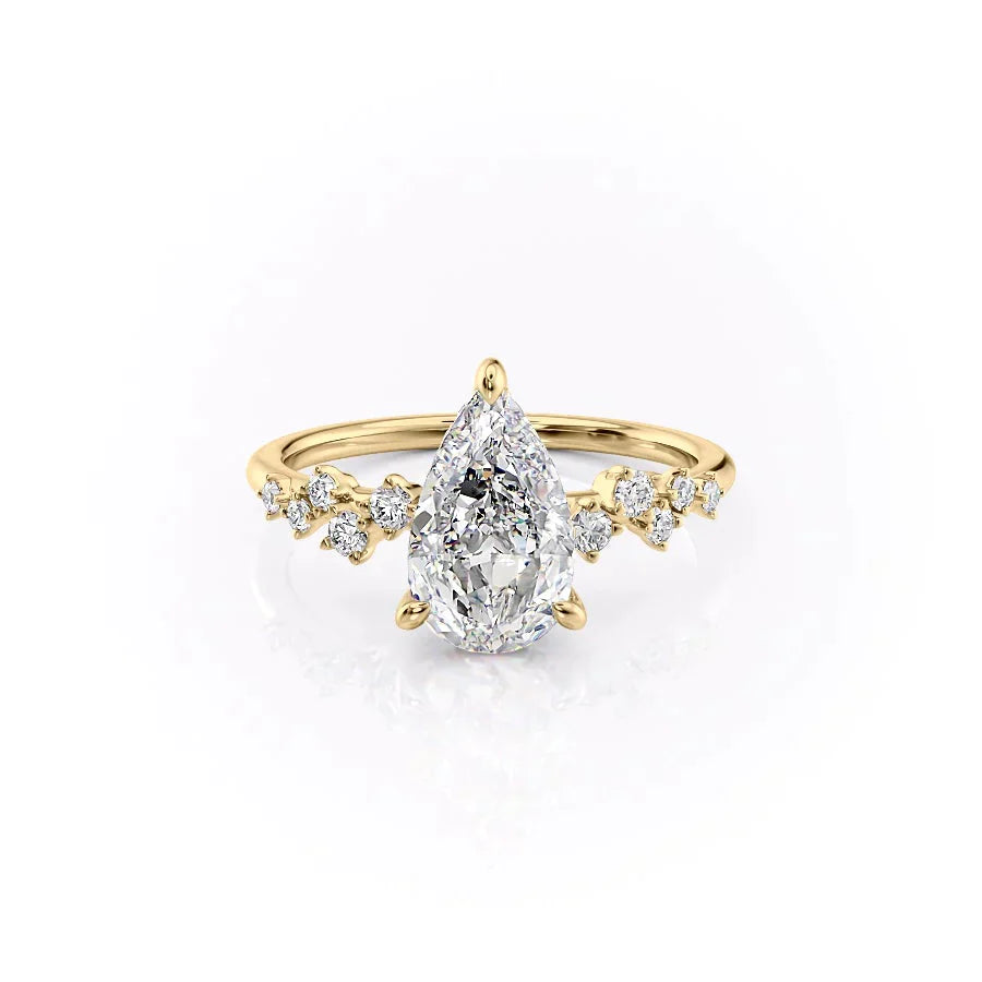 The Mia Set With A 1.5 Carat Pear 18K Yellow Gold Lab Diamond