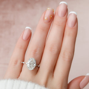 The Penelope Set  With A 2 Carat Oval 18K White Gold Moissanite