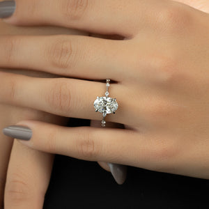 The Penelope Set  With A 2.5 Carat Oval 18K White Gold Moissanite
