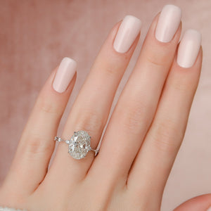 The Penelope Set  With A 1.5 Carat Oval 18K White Gold Moissanite