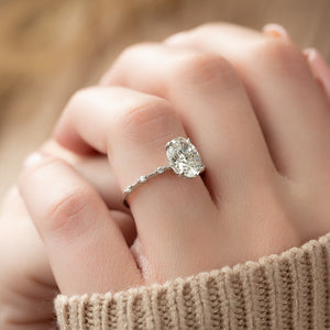 The Penelope Set  With A 1 Carat Oval 18K White Gold Moissanite