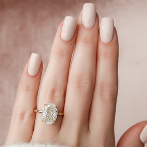 The Nelly Set  With A 2.5 Carat Oval 18K Yellow Gold Moissanite