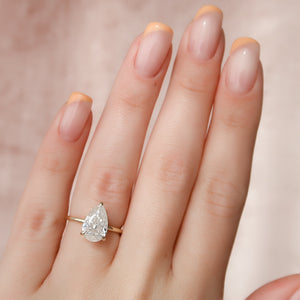 The Nelly Set  With A 2.5 Carat Pear 14K Yellow Gold Moissanite