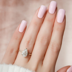 The Nelly Set  With A 2.5 Carat Pear 14K Yellow Gold Moissanite