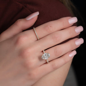 The Pave Nelly Set  With A 4.5 Carat Oval 18K Yellow Gold Moissanite