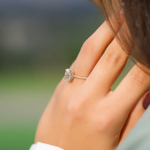 The Pave Nelly Set  With A 4 Carat Oval 18K Yellow Gold Moissanite
