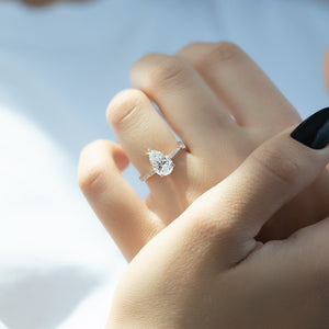 The Pave Nelly Set With A 3 Carat Pear 18K Rose Gold Lab Diamond