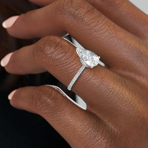 The Nelly Set  With A 4 Carat Pear 18K White Gold Moissanite