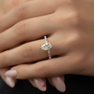 The Lindsey Set With A 1 Carat Pear 18K Yellow Gold Lab Diamond