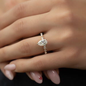 The Lindsey Set  With A 3 Carat Pear 14K Yellow Gold Moissanite