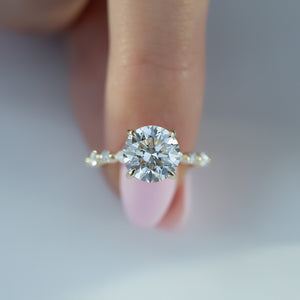 The Lindsey Set  With A 1.5 Carat Round 18K Yellow Gold Moissanite