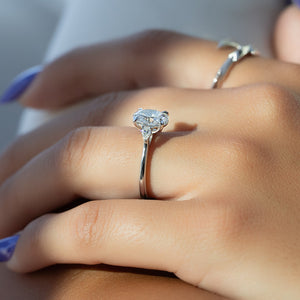 The Pears Liv Set  With A 2.5 Carat Oval 14K White Gold Moissanite