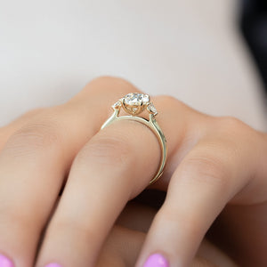 The Pears Liv Set  With A 2.5 Carat Oval 18K Yellow Gold Moissanite