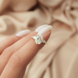 The Pears Liv Set  With A 2.5 Carat Oval 18K Yellow Gold Moissanite