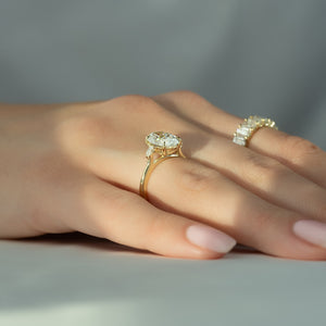 The Pears Liv Set  With A 2.5 Carat Oval 18K Yellow Gold Moissanite