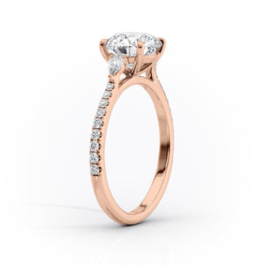 The Pears Liv Set With A 1 Carat Pear 14K Rose Gold Lab Diamond