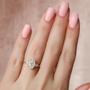 The Lia Set  With A 4.5 Carat Oval 18K Yellow Gold Moissanite