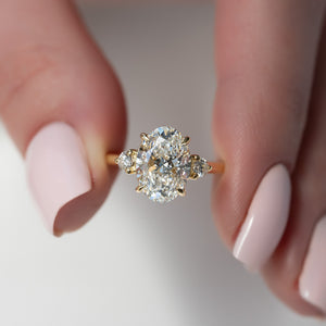 The Lia Set  With A 4.5 Carat Oval 18K Yellow Gold Moissanite