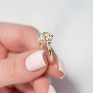 The Lia Set  With A 4.5 Carat Oval 18K Yellow Gold Moissanite