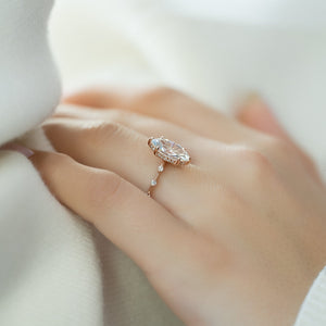 The Penelope Set Hidden Halo  With A 5 Carat Marquise 14K Rose Gold Moissanite