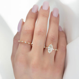 The Penelope Set Hidden Halo  With A 2.5 Carat Marquise 14K Yellow Gold Moissanite