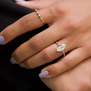 The Penelope Set Hidden Halo  With A 3 Carat Marquise 18K Yellow Gold Moissanite