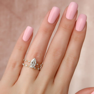 The Penelope Set Hidden Halo  With A 2.5 Carat Marquise 18K Yellow Gold Moissanite