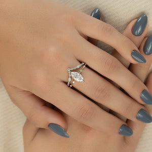 The Penelope Set Hidden Halo  With A 4 Carat Marquise 18K Yellow Gold Moissanite