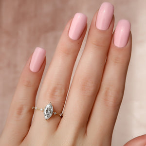 The Penelope Set Hidden Halo  With A 4 Carat Marquise 14K Yellow Gold Moissanite