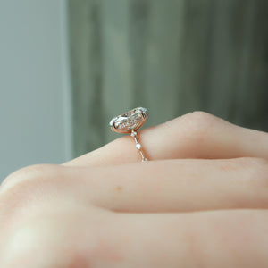 The Penelope Set Hidden Halo  With A 4.5 Carat Oval 18K Rose Gold Moissanite