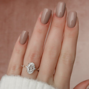 The Penelope Set Hidden Halo  With A 2 Carat Oval 14K Rose Gold Moissanite