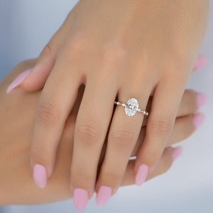 The Penelope Set Hidden Halo  With A 2.5 Carat Oval 14K Rose Gold Moissanite