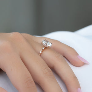 The Penelope Set Hidden Halo  With A 2.5 Carat Oval 14K Rose Gold Moissanite