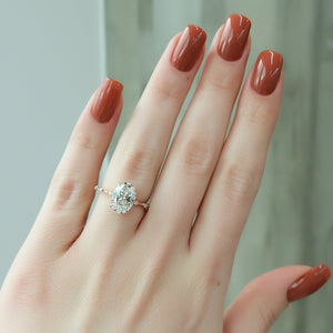 The Penelope Set Hidden Halo  With A 2.5 Carat Oval 14K Rose Gold Moissanite
