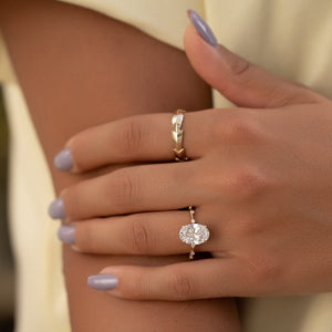 The Penelope Set Hidden Halo  With A 2.5 Carat Oval 18K Yellow Gold Moissanite