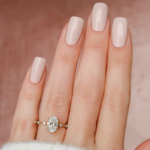 The Penelope Set Hidden Halo  With A 2 Carat Oval 14K Yellow Gold Moissanite