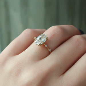 The Penelope Set Hidden Halo  With A 4 Carat Oval 18K Yellow Gold Moissanite